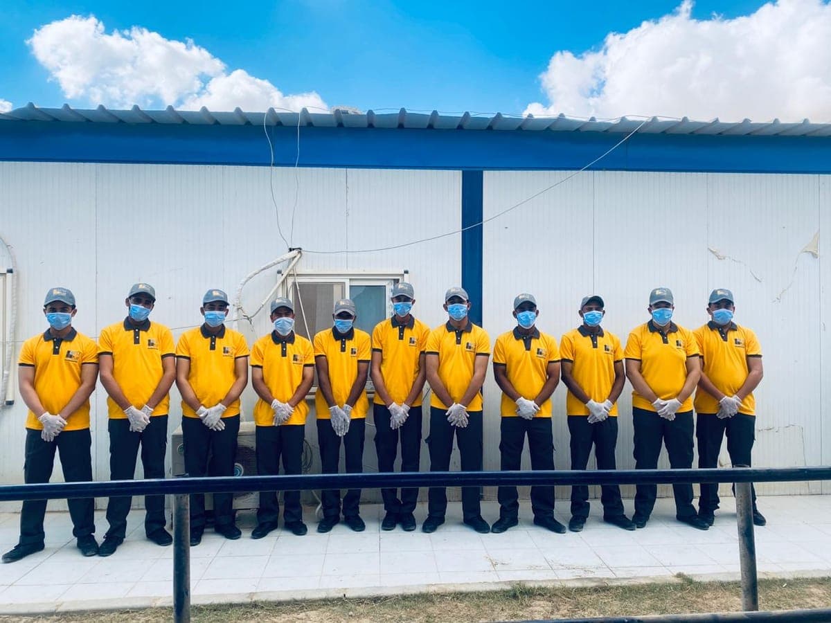 FM+ housekeeping team in uniform at a client site